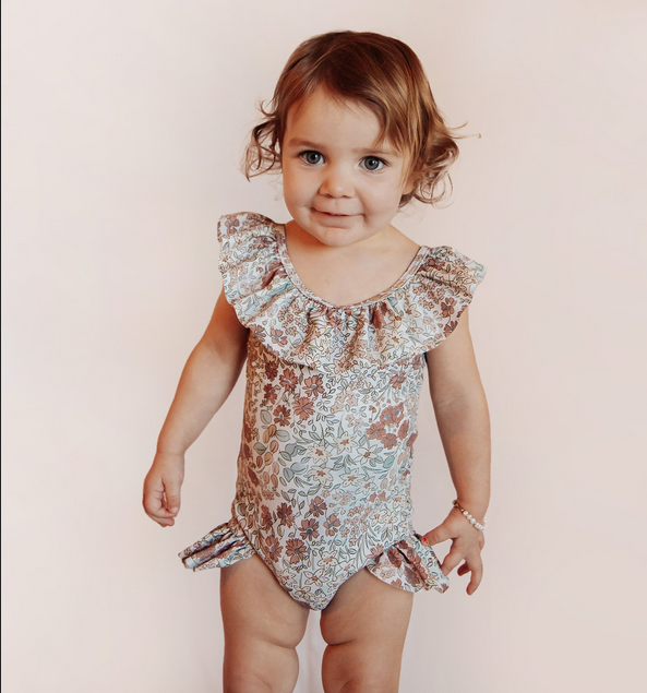 toddler in ruffle swimming suit