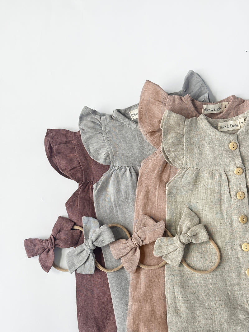 linen baby romper with bow