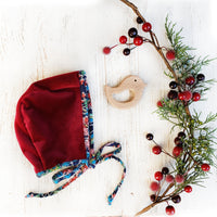 scarlet Velvet Baby Bonnet with winter print reversbile